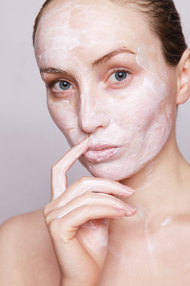 woman with face mask as example of cosmetics containing parabens